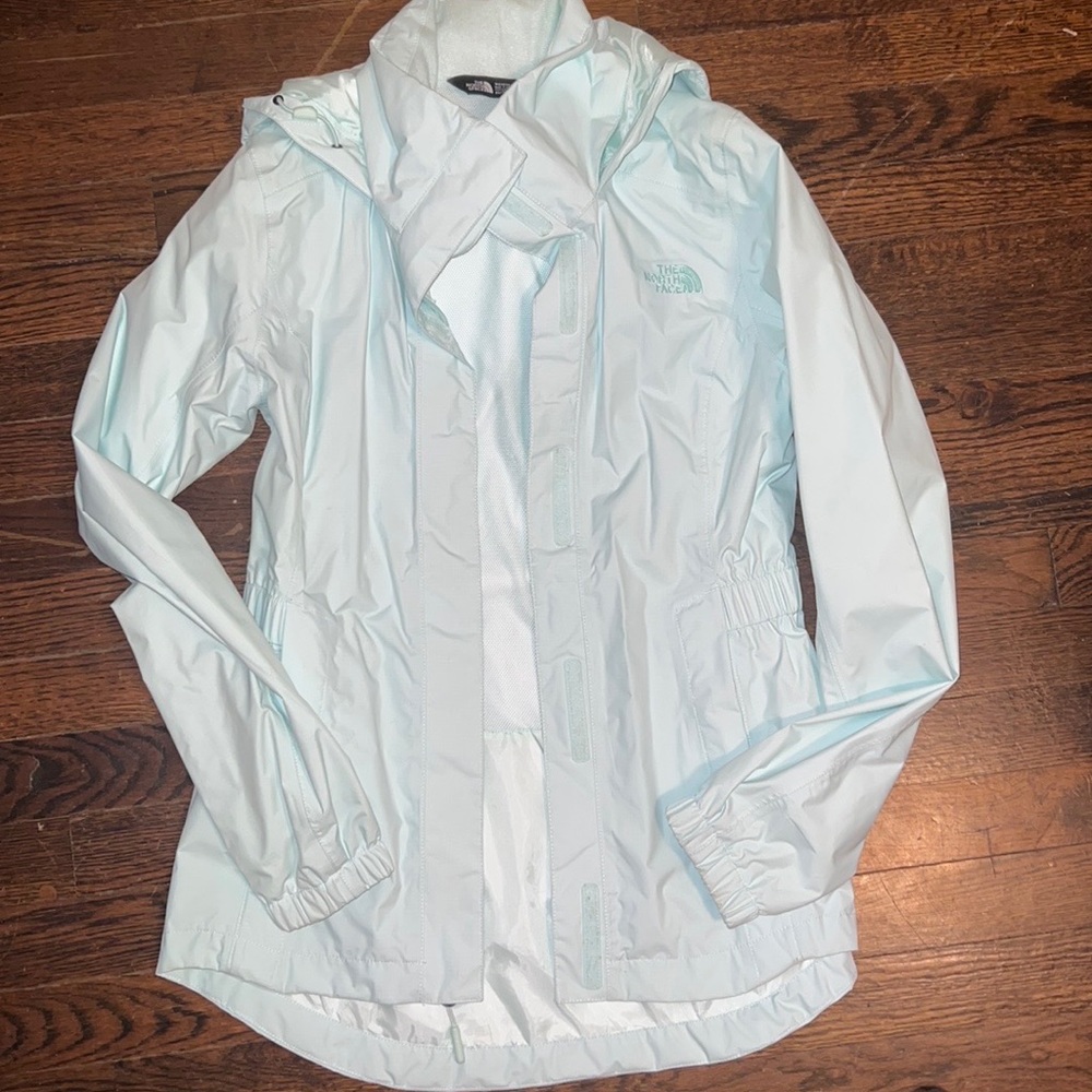 North face mint green rain jacket.